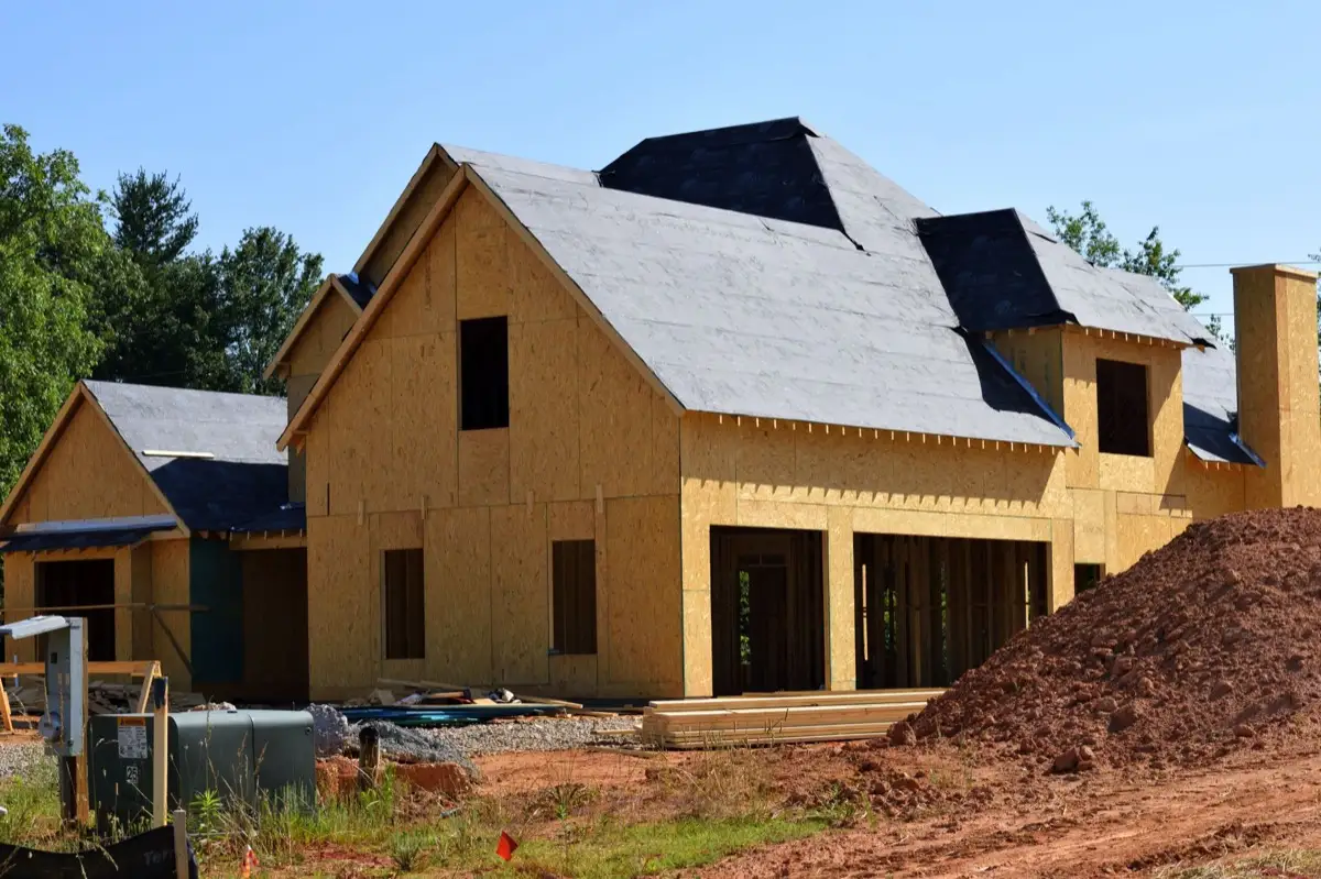 House with new roof decking and synthetic underlayment during a roof replacement in Little Rock, AR
